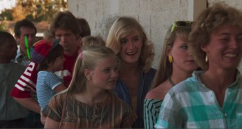 Movie still from “Smooth Talk” (1985), directed by Joyce Chopra – A group of young women standing next to each other; Medium shot, Over the shoulder angle