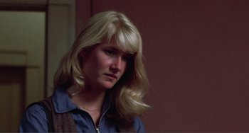 Movie still from “Smooth Talk” (1985), directed by Joyce Chopra – A woman with long blonde hair looking to her left; Close Up shot, Over the shoulder angle