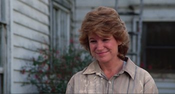 Movie still from “Smooth Talk” (1985), directed by Joyce Chopra – A person wearing a shirt; Close Up shot, Over the shoulder angle