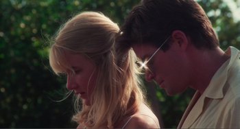 Movie still from “Smooth Talk” (1985), directed by Joyce Chopra – A man and a woman standing next to each other; Close Up shot, Low angle