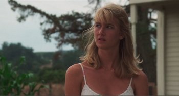 Movie still from “Smooth Talk” (1985), directed by Joyce Chopra – A woman with long blonde hair wearing a white top; Close Up shot, Low angle