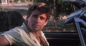 Movie still from “Smooth Talk” (1985), directed by Joyce Chopra – A person sitting in a car; Close Up shot, Over the shoulder angle