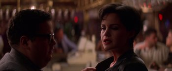 Movie still from “Snake Eyes” (1998), directed by Brian De Palma – A man and a woman are talking in a restaurant; Close Up shot, Over the shoulder angle