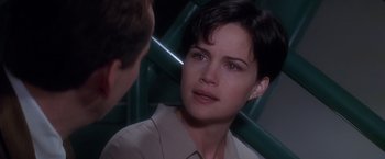 Movie still from “Snake Eyes” (1998), directed by Brian De Palma – Close Up shot, Over the shoulder angle