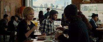Movie still from “Snatched” (2017), directed by Jonathan Levine – A group of people sitting at a table with drinks; Medium shot, Over the shoulder angle
