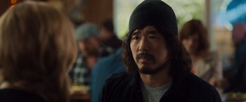 Movie still from “Snatched” (2017), directed by Jonathan Levine – A person wearing a hat; Close Up shot, Over the shoulder angle