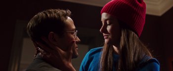 Movie still from “Snowden” (2016), directed by Oliver Stone – A man and a woman looking at one another; Close Up shot, Low angle