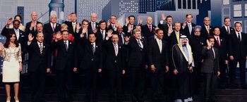 Movie still from “Snowden” (2016), directed by Oliver Stone – A group of men in suits and ties wave; Wide shot, High angle