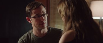 Movie still from “Snowden” (2016), directed by Oliver Stone – A man and a woman talking to each other; Close Up shot, Over the shoulder angle