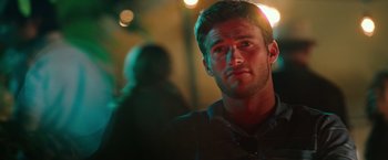 Movie still from “Snowden” (2016), directed by Oliver Stone – A person in a dark room; Close Up shot, Over the shoulder angle