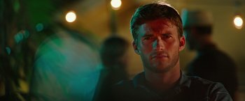 Movie still from “Snowden” (2016), directed by Oliver Stone – A person in a room with lights; Close Up shot, Over the shoulder angle