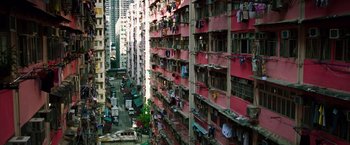 Movie still from “Snowden” (2016), directed by Oliver Stone – A view of a city from a high rise building; Extreme Wide shot, High angle