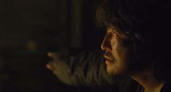 Movie still from “Snowpiercer” (2013), directed by Bong Joon Ho – A person wearing a glove; Close Up shot, Low angle