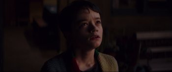 Movie still from “A Monster Calls” (2016), directed by J.A. Bayona – A young boy is looking up at the sky; Close Up shot, Low angle