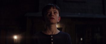 Movie still from “A Monster Calls” (2016), directed by J.A. Bayona – A young boy is looking up at the ceiling; Close Up shot, Low angle