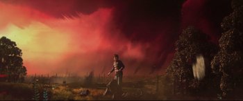 Movie still from “A Monster Calls” (2016), directed by J.A. Bayona – A man standing in front of a red sky; Extreme Wide shot, Low angle