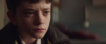 Movie still from “A Monster Calls” (2016), directed by J.A. Bayona – A young boy's face; Close Up shot, Over the shoulder angle