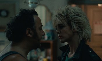 Movie still from “So Long, Stooge” (1983), directed by Claude Berri – A man and a woman face to face in a room; Close Up shot, Over the shoulder angle