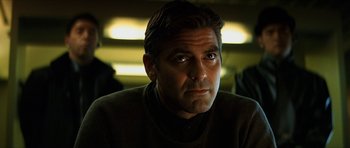 Movie still from “Solaris” (2002), directed by Steven Soderbergh – A person wearing a sweater; Close Up shot, Low angle