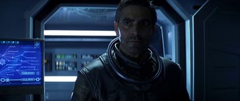 Movie still from “Solaris” (2002), directed by Steven Soderbergh – A person wearing a space suit; Close Up shot, Low angle