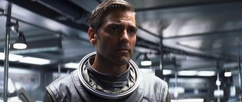 Movie still from “Solaris” (2002), directed by Steven Soderbergh – A person wearing a space suit; Close Up shot, Low angle