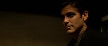 Movie still from “Solaris” (2002), directed by Steven Soderbergh – A person looking at the camera; Close Up shot, Low angle