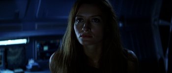 Movie still from “Solaris” (2002), directed by Steven Soderbergh – A woman with long brown hair stares into the camera; Close Up shot, Low angle