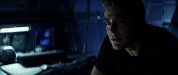 Movie still from “Solaris” (2002), directed by Steven Soderbergh – A person wearing a black shirt; Close Up shot, Low angle