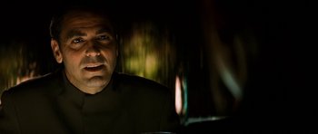 Movie still from “Solaris” (2002), directed by Steven Soderbergh – A person in a dark room; Close Up shot, Over the shoulder angle