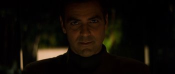 Movie still from “Solaris” (2002), directed by Steven Soderbergh – A person wearing a black shirt; Close Up shot, Low angle