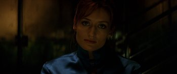 Movie still from “Solaris” (2002), directed by Steven Soderbergh – A person wearing a blue shirt and tie; Close Up shot, Over the shoulder angle