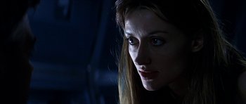 Movie still from “Solaris” (2002), directed by Steven Soderbergh – A person with long hair; Close Up shot, Low angle