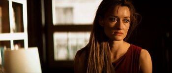 Movie still from “Solaris” (2002), directed by Steven Soderbergh – A person with long brown hair; Close Up shot, Over the shoulder angle