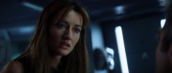 Movie still from “Solaris” (2002), directed by Steven Soderbergh – A person with her eyes wide open crying; Close Up shot, Low angle