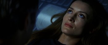 Movie still from “Solaris” (2002), directed by Steven Soderbergh – A person with long hair; Close Up shot, Over the shoulder angle