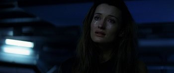 Movie still from “Solaris” (2002), directed by Steven Soderbergh – A person with a crying face; Close Up shot, Low angle