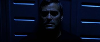 Movie still from “Solaris” (2002), directed by Steven Soderbergh – A person in a dark room; Close Up shot, Low angle