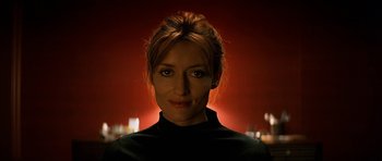 Movie still from “Solaris” (2002), directed by Steven Soderbergh – A person wearing a black shirt; Close Up shot, Low angle