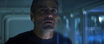 Movie still from “Solaris” (2002), directed by Steven Soderbergh – A person looking at the camera; Close Up shot, Low angle