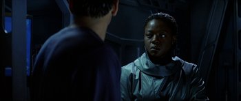 Movie still from “Solaris” (2002), directed by Steven Soderbergh – A man and a woman are looking at each other in a mirror; Close Up shot, Over the shoulder angle