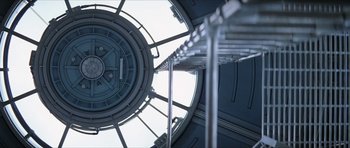 Movie still from “Solaris” (2002), directed by Steven Soderbergh – Looking up at a lighthouse from the inside; Extreme Wide shot, Overhead angle