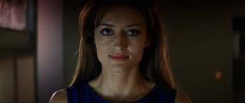 Movie still from “Solaris” (2002), directed by Steven Soderbergh – A person wearing a blue shirt; Close Up shot, Low angle