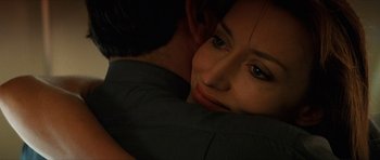 Movie still from “Solaris” (2002), directed by Steven Soderbergh – A person holding on to a pillow; Close Up shot, Over the shoulder angle