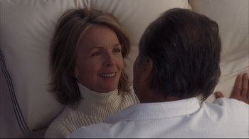 Movie still from “Something's Gotta Give” (2003), directed by Nancy Meyers – An older woman sitting next to an older man in bed; Close Up shot, Over the shoulder angle