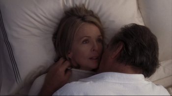 Movie still from “Something's Gotta Give” (2003), directed by Nancy Meyers – A man and a woman laying in a bed together; Close Up shot, Overhead angle