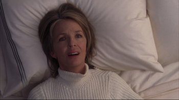 Movie still from “Something's Gotta Give” (2003), directed by Nancy Meyers – A person laying in a bed; Close Up shot, High angle