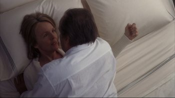 Movie still from “Something's Gotta Give” (2003), directed by Nancy Meyers – A man and a woman in a bed; Medium shot, Overhead angle
