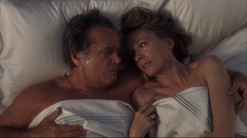 Movie still from “Something's Gotta Give” (2003), directed by Nancy Meyers – A man and a woman laying in a bed together; Close Up shot, Overhead angle