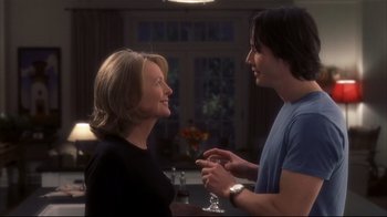 Movie still from “Something's Gotta Give” (2003), directed by Nancy Meyers – A man and a woman talking to each other; Medium shot, Over the shoulder angle
