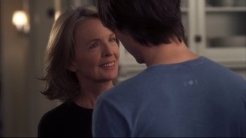Movie still from “Something's Gotta Give” (2003), directed by Nancy Meyers – An older woman and a younger man are talking to each other; Close Up shot, Over the shoulder angle